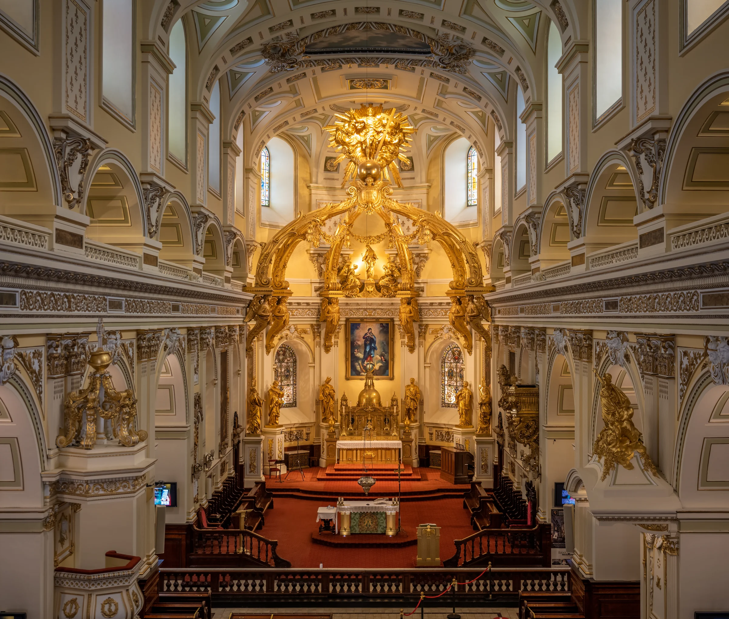 Symmetrical gilded interior of the Basilica-Cathedral Notre-Dame de Québec.